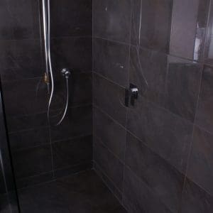 marzio_nero_polished_tile_30x60_tile_trends_nz